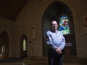 "It?s a beautiful old chapel. It has a lot of history." - Dale Jardine, shown standing inside the church (DEREK RUTTAN, The London Free Press)