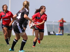 Kingston native Annie Kennedy prepares to pass the ball during U16 women's rugby action at Rugby Canada's National Championship Festival in Calgary on Tuesday. (Barb Di Nardo/Rugby Ontario)