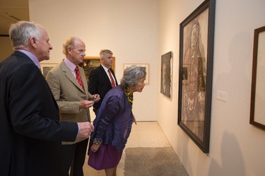 Hon. Colonel-in-Chief PPCLI Adrienne Clarkson (centre), John Ralston Saul (centre (left), artist Bill Bewick (left) and Major S.G.J. Lerch, regimental major, look at art at the official opening of Forging A Nation: Canada Goes To War at the University of Alberta Museums Enterprise Square Galleries in Edmonton, Alta., on Wednesday, Aug. 6, 2014. The art exhibition runs through Aug. 16, and coincides with the 100th anniversary of the Princess Patricia's Canadian Light Infantry. Ian Kucerak/Edmonton Sun/QMI Agency