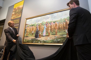 Painter Bill Bewick's painting of a 1914 colour ceremony at Lansdowne Park in Ottawa involving Princess Patricia (in blue) and the regiment named in her honour is unveiled at the official opening of Forging A Nation: Canada Goes To War at the University of Alberta Museums Enterprise Square Galleries in Edmonton, Alta., on Wednesday, Aug. 6, 2014. The art exhibition runs through Aug. 16, and coincides with the 100th anniversary of the Princess Patricia's Canadian Light Infantry. Ian Kucerak/Edmonton Sun/QMI Agency