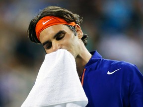 Roger Federer says not to sweat how often tennis pros go for the towel during matches. (Reuters)
