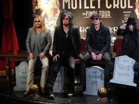 Members of rock band Motley Crue (L-R) Vince Neil, Nikki Sixx, Tommy Lee and Mick Mars pose at a news conference announcing The Final Tour in Hollywood, California January 28, 2014. REUTERS/Mario Anzuoni