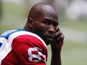 Montreal Alouettes WR Chad Johnson (85) sits on the bench while his team plays against the B.C Lions during the first half of their CFL football game in Vancouver, British Columbia, July 19, 2014. REUTERS/Ben Nelms    (CANADA - Tags: SPORT FOOTBALL)