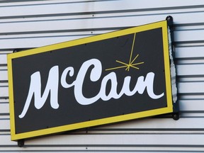 A McCain Foods company logo is pictured outside a factory of the French fry maker company in Harnes, northern France, December 5, 2011.  (REUTERS file photo/Pascal Rossignol)