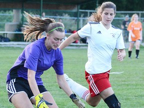 Cosmos (white shirts) vs. Brighton Kirlene in Thursday night action in the Bay of Quinte Women's Soccer League. Cosmos won, 5-0. (ZACHARY SHUNOCK/The Intelligencer)