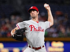 Philadelphia Phillies starting pitcher Cole Hamels delivers a pitch in the first inning against the Atlanta Braves.  REUTERS/Tami Chappell