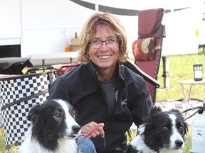 Lee Lumb, from near Vernon, B.C., is one of about 80 handlers taking part in this weekend's Kingston Sheepdog Trials at Grass Creek Park.  FRI., AUG 8, 2014 KINGSTON, ONT. MICHAEL LEA\THE WHIG STANDARD\QMI AGENCY