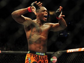 Ovince Saint Preux reacts after defeating Ryan Jimmo in their light-heavyweight bout for UFC 174 at Rogers Arena on June 14, 2014. (Anne-Marie Sorvin/USA TODAY Sports)