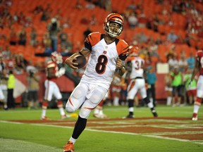 Cincinnati Bengals quarterback Matt Scott (8) runs in for a touchdown during the second half against the Kansas City Chiefs at Arrowhead Stadium on Aug 7, 2014 in Kansas City, MO, USA. (Denny Medley-USA TODAY Sports)