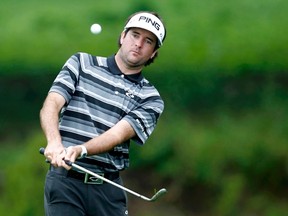 Bubba Watson of the U.S. chips on to the eighth green during the second round of the PGA Championship at Valhalla Golf Club in Louisville, Kentucky, August 8, 2014. REUTERS/John Sommers II