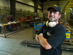 Andres Hernandez of London is all smiles after landing a well-paying job at Chandco Manufacturing Inc. on Admiral Dr. Since April, the London area has added 7,100 jobs. (Mike Hensen/The London Free Press)