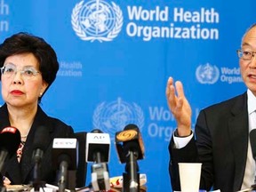 World Health Organization (WHO) Director-General Margaret Chan (L) sits next to Keiji Fukuda, WHO's assistant director general for health security, as he addresses the media after a two-day meeting of its emergency committee on Ebola, in Geneva August 8, 2014.  REUTERS/Pierre Albouy