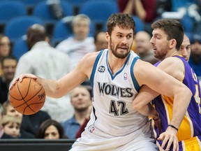 Minnesota Timberwolves power forward Kevin Love dribbles the ball against the Los Angeles Lakers at the Target Center in Minneapolis, Feb. 4, 2014. (BRAD REMPEL/USA Today)