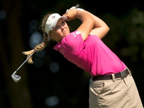 Brooke Mackenzie Henderson plays her tee shot on the third hole during the semifinal round of match play at the 2014 U.S. Women's Amateur at Nassau Country Club in Glen Cove, N.Y. on Saturday, Aug. 9, 2014. (USGA/Darren Carroll)