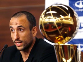 San Antonio Spurs guard Manu Ginobili of Argentina speaks during a news conference upon his arrival at the airport in Buenos Aires July 4, 2014. (REUTERS/Enrique Marcarian)
