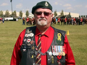 Former Princess Patricia's Canadian Light Infantry (PPCLI) member Tom Scott, 70, stands at the grounds outside the Lecture Training Facility at CFB Edmonton  in Edmonton, AB on August 9, 2014. Scott took part in the PPCLI's centennial parade as a member of the old guard regiment. Scott served with the PPCLI's from 1963 to 1988.  TREVOR ROBB/Edmonton Sun/QMI Agency