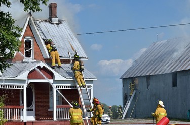 No one was injured in a house fire that damaged one home Saturday afternoon on 131 St-Guillaume. The flames were so hot at one point that a nearby car partially melted. A nearby barn was also at risk but firefighters were able to keep the fire from spreading. Stephanie MacNeill photos