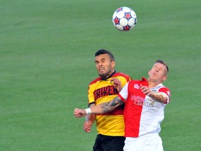 Fury midfielder Nicki Paterson jumps for a header against a Fort Lauderdale Strikers player during Saturday’s match in Ottawa. Dean Joncas/Ottawa Sun