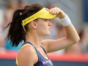 Agnieszka Radwanska (POL) reacts during her match against Ekaterina Makarova (RUS) on day six of the Rogers Cup tennis tournament at Uniprix Stadium on Aug 9, 2014 in Montreal, Quebec, Canada. (Eric Bolte/USA TODAY Sports)