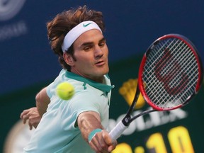 Feliciano Lopez plays against Roger Federer at The Rogers Cup at the Rexall Centre in Toronto, Ont. on Saturday August 9, 2014. (Dave Thomas/QMI Agency)