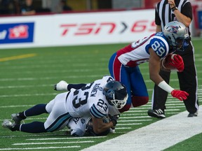 Vincent Agnew in action against the Montreal Alouettes. (Pierre-Paul Poulin, QMI Agency)