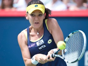 Agnieszka Radwanska returns to Venus Williams during Sunday's final at the Rogers Cup in Montreal. (QMI Agency)
