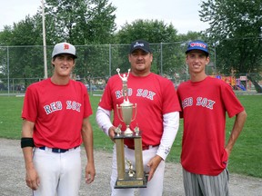 Eddie Roy, centre, poses for a photo with sons Jeremy and Justin after they won the Brad Rienguette Shamou Shoot Out Memorial Fastball Tournament last month. Roy will compete in the International Softball Congress Fastball Championships later this week.