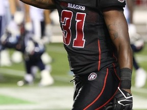 Jasper Simmons, #31 of the Ottawa Redblacks, celebrates the franchise's first win after defeating the Toronto Argonauts at TD Place Stadium on July 18, 2014 in Ottawa, Ontario, Canada. (Andre Ringuette/Getty Images/AFP)