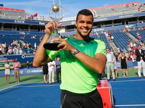 Jo-Wilfred Tsonga (FRA) defeated Roger Federer (SUI) in straight sets Sunday afternoon to win the Rogers Cup in Toronto, Ont. (Stan Behal/Toronto Sun/QMI Agency)