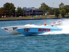 Boats whip around the bend while taking part in the International Powerboat Festival on the St. Clair this weekend. BRENT BOLES / THE OBSERVER / QMI AGENCY​