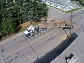 A logging truck snagged overhead utility lines in Whitecourt on the morning of Sunday, Aug. 10. Telephone cables attatched to the utility poles at the intersection of 51 Avenue and 51 Street got caught up on logs being carried by the truck, pulling the utility into a slight angle. The intersection was  closed for over six hours while crews worked to untangle the line and repair the pole. Electrical service to Whitecourt was not interrupted during the incident.