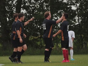 Members Portage United celebrate a goal from Braden Nicoll during Portage's 3-2 win over Winnipeg FC Aug.10. (Kevin Hirschfield/The Graphic)