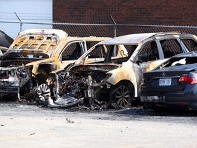 Up to eight cars were damaged by a fire at Quality Used Cars Wholesale at 30 Toro Rd. early Monday. (DAVE ABEL/Toronto Sun)