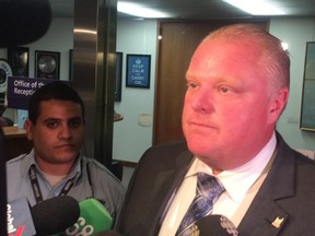 Rob Ford speaks about a bomb threat against City Hall on Monday, Aug. 11, 2014. (DON PEAT/Toronto Sun)