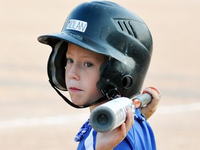 Nolan Vessie of the Mitchell Major Rookie Tier 2 #3 baseball team gets ready for his at-bat during the weekend tournament in Mitchell. ANDY BADER/MITCHELL ADVOCATE