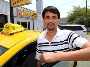 Suraj Kumar  is the owner of Kingston's newest taxi companies, City Taxi.  (Ian MacAlpine/The Whig-Standard)