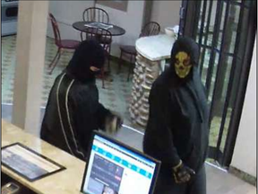 Two suspects in the Sunday, Aug. 10 armed robbery of the Quality Inn in Whitecourt. RCMP photo
