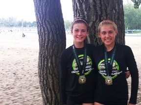 Katelyn Gratton (left) and Jordyn Knowles of the Sarnia Twin Bridges Volleyball Club took home gold medals in the Ontario Volleyball Association beach championships in the 14 and Under Trillium 4 division recently. Teammates Ella Lassaline and Alex Mulder also competed, winning bronze in the 16 and Under Trillum 3 division.  (Submitted photo)