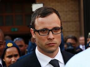 Paralympic track star Oscar Pistorius leaves after listening to the closing arguments in his murder trial at the high court in Pretoria August 7, 2014. (REUTERS)