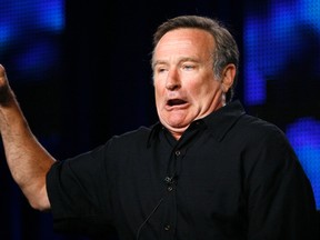 Robin Williams gestures during a panel discussion for his upcoming HBO show "Robin Williams: Weapons of Self-Destruction" at the Television Critics Association Cable summer press tour in Pasadena, California in this file picture taken July 30, 2009. REUTERS/Mario Anzuoni/Files