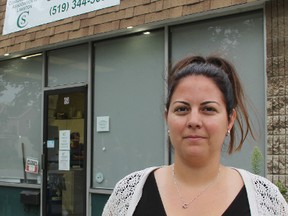 Sabrina Rocca, executive director of the Consumer Survivor Association of Lambton, stands outside the agency's current location on Christina Street, across from Rainbow Park. Thanks to a $25,000 Sarnia Community Foundation grant, the agency that helps people dealing with mental illness is moving to a bigger location and is expanding its programming to offer more aid. TYLER KULA/ THE OBSERVER/ QMI AGENCY