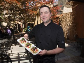 Chef Scott Wesseling, of London?s Black Trumpet on Richmond Row, shows off the restaurant?s popular fish tacos. (DEREK RUTTAN/ The London Free Press)