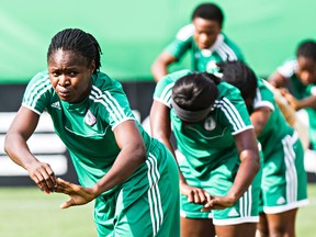 Nigerian players practice at Commonwealth Stadium Tuesday in advance of Wednesday's game against England. (Codie McLachlan, Edmonton Sun)