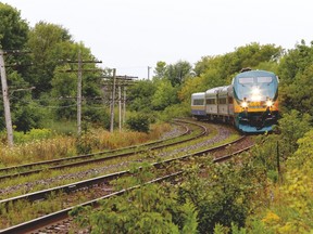 A Via Rail passenger train approaches the Oxford Avenue crossing on Tuesday (DARCY CHEEK/The Recorder and Times).