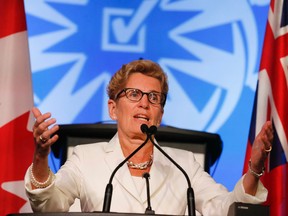 Ontario Premier Kathleen Wynne speaks at the Elementary Teachers Federation of Ontario (ETFO) annual meeting, where she was greeted coolly at the Westin Harbour Castle in Toronto, ON, on Wednesday, August 13, 2014. (STAN BEHAL/Toronto Sun)