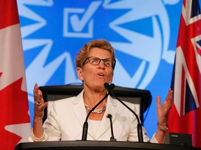 Ontario Premier Kathleen Wynne speaks at the Elementary Teachers' Federation of Ontario (ETFO) annual meeting, where she was greeted coolly at the Westin Harbour Castle in Toronto, ON, on Wednesday, August 13, 2014. (STAN BEHAL/Toronto Sun)