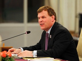 Canada's Foreign Minister John Baird gives a speech during the ASEAN-Canada Foreign Ministers meeting at Myanmar International Convention Centre (MICC) in Naypyitaw August 9, 2014. REUTERS/Soe Zeya Tun