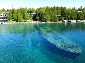 Police reported a scuba diver from Brampton died Tuesday, Aug. 12, 2014, at Bruce Peninsula National Marine Park at the Caroline Rose dive site. Flowerpot Island (with a nearby dive site pictured here), is a frequent stop for visitors at the park.(QMI Agency files)