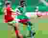 England's Leah Williamson kicks the ball past Nigeria's Asisat Oshoala during FIFA U-20 Women's World Cup action between Paraguay and England at Commonwealth Stadium in Edmonton, Alta., on Wednesday, Aug. 13, 2014. Codie McLachlan/Edmonton Sun/QMI Agency