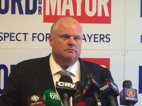 Mayor Rob Ford holds a press conference at his campaign headquarters on Thursday, Aug. 14, 2014. (DON PEAT/Toronto Sun)